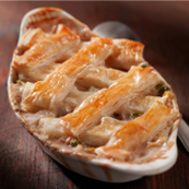 Carruca Dormitoria con ripieno di formaggio e prosciutto, cotta al forno.