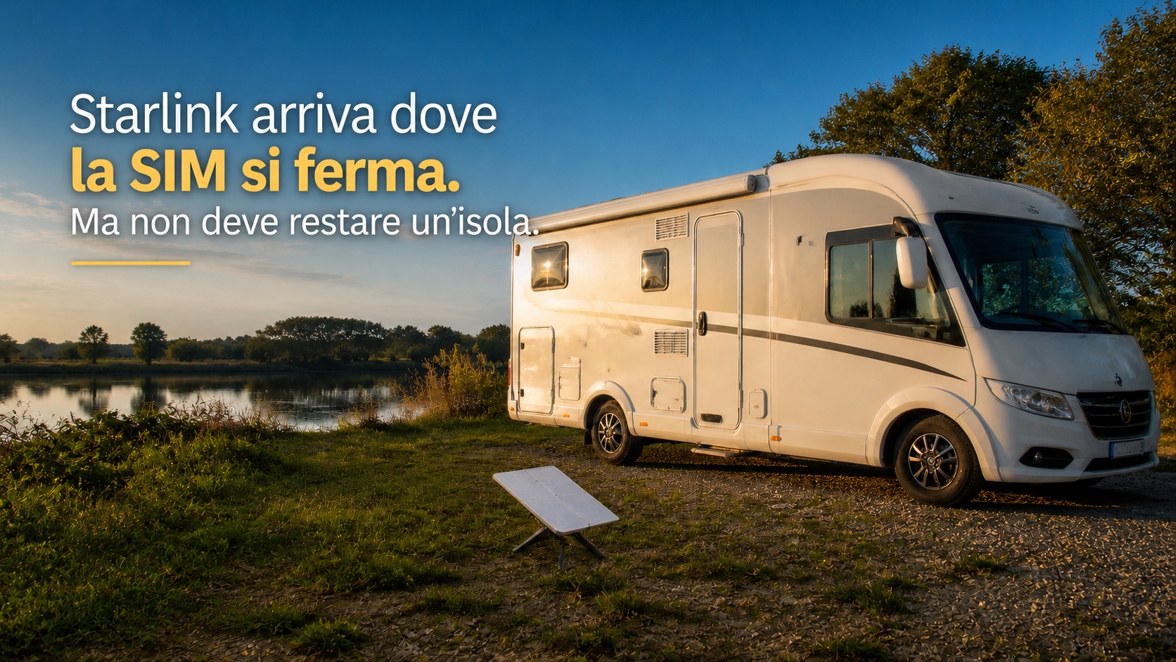 Camper con antenna Starlink in sosta vicino a un fiume